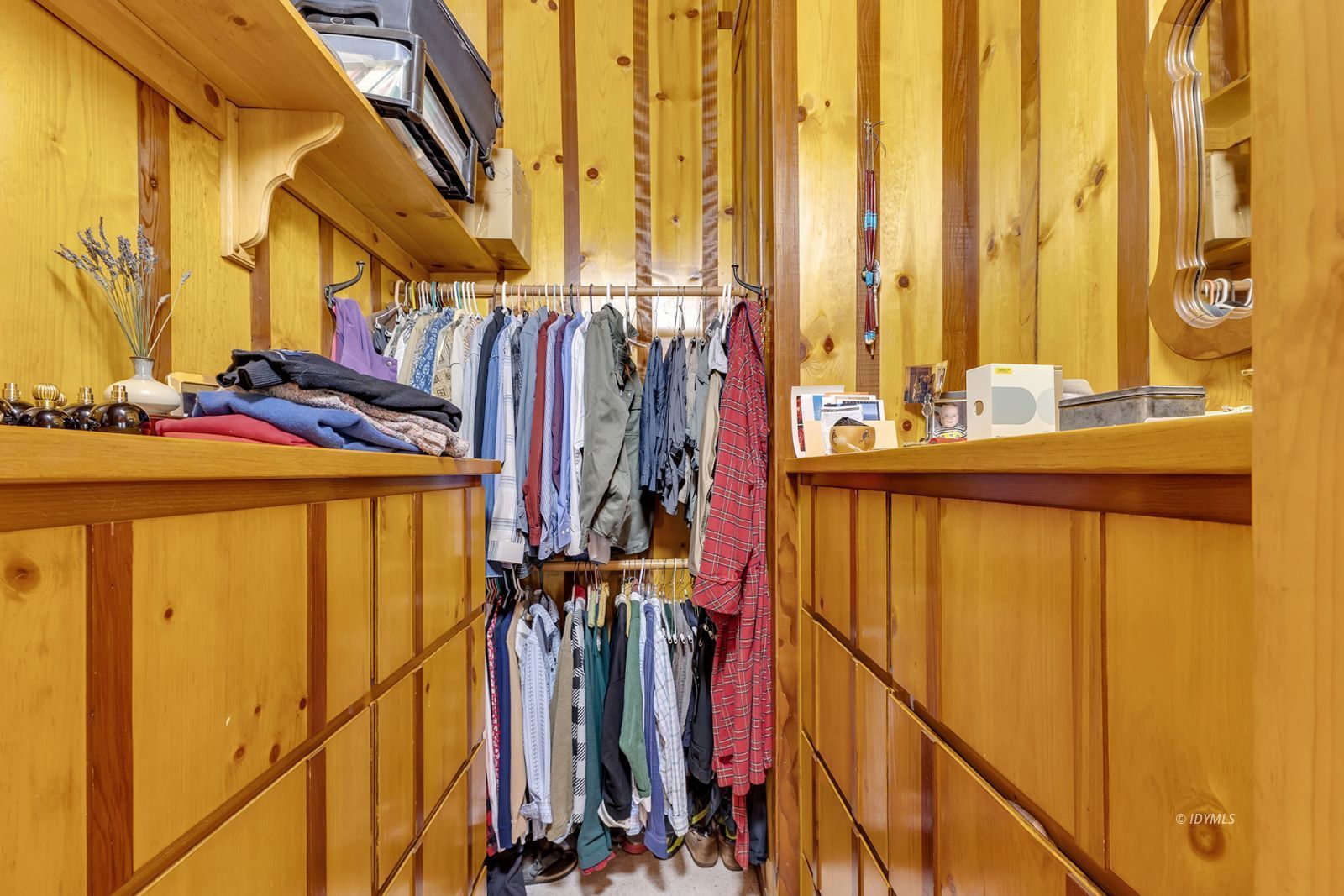 25100 Indian Rock Road Idyllwild, CA 92549 - Photo 48 of 75 a view of walk in closet with clothes and shoes