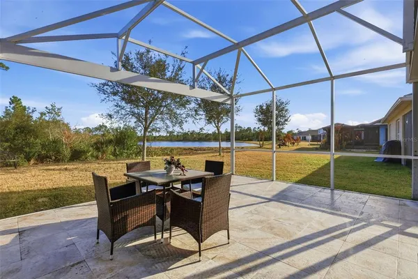 a view of a swimming pool with a lounge chairs