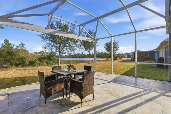 a view of a swimming pool with a lounge chairs