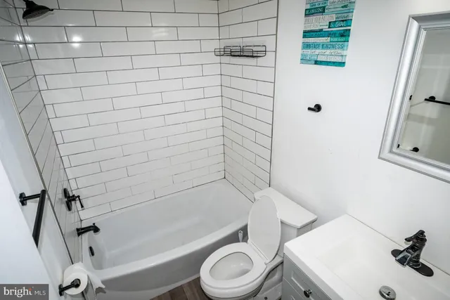 a bathroom with a sink and a toilet