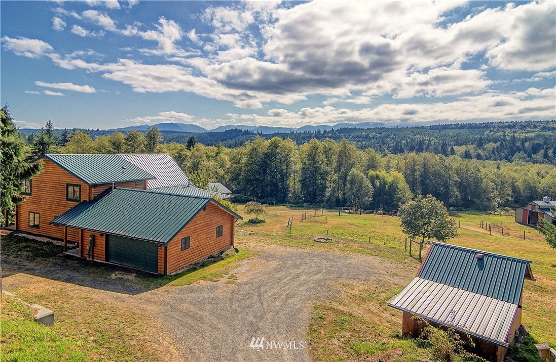 1072 Dabob Road Quilcene, WA 98376 - Photo 2 of 25 swimming pool view with a garden