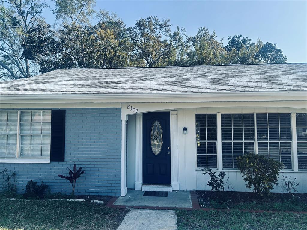 8302 Split Rail Lane Hudson, FL 34667 - Photo 1 of 21 a view of a house with potted plants and a yard
