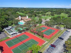 8302 Split Rail Lane Hudson, FL 34667 - Photo 20 of 21 a view of a tennis court