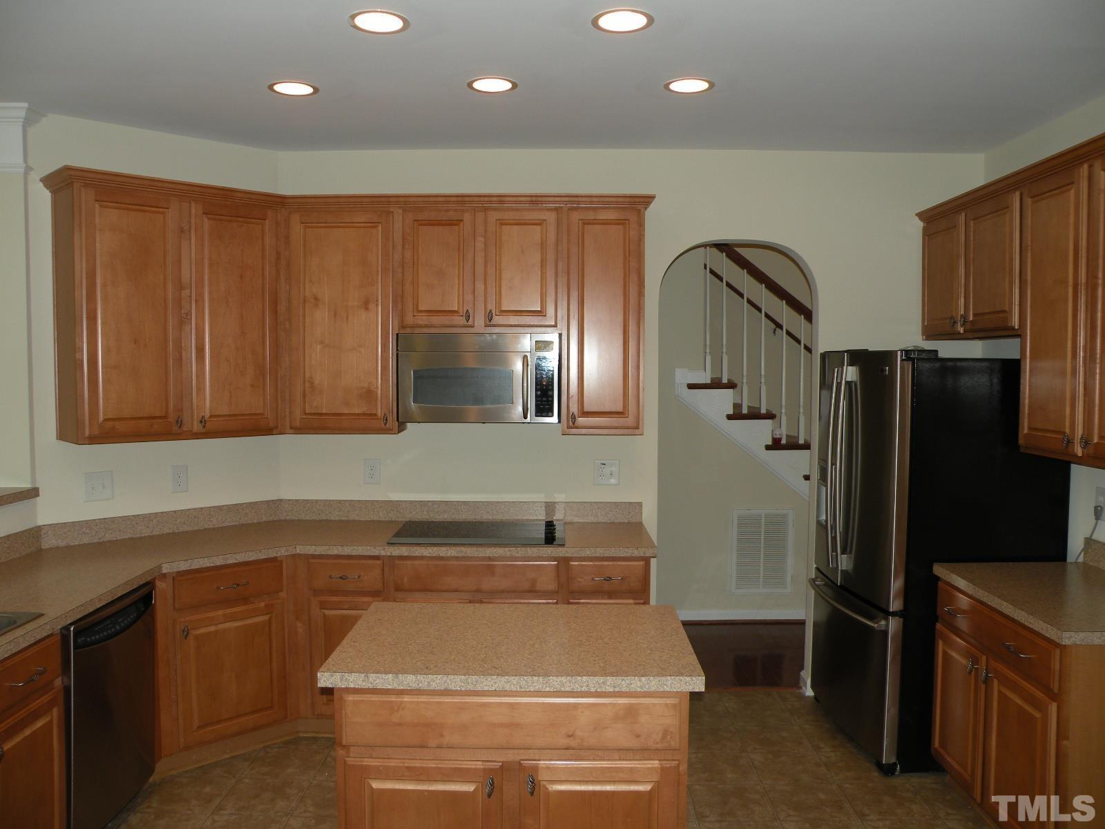 4733 Porchaven Lane Apex, NC 27539 - Photo 6 of 25 a bathroom with a bathtub and a sink