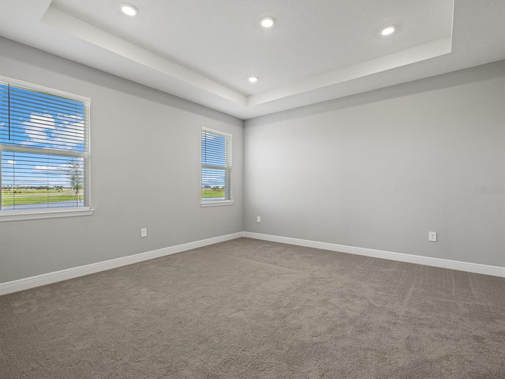 17707 Gulf Rnch Place Bradenton, FL 34211 - Photo 20 of 27 an empty room with windows