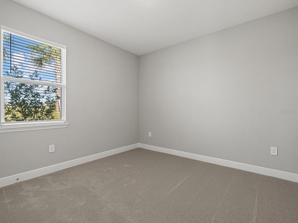 17707 Gulf Rnch Place Bradenton, FL 34211 - Photo 22 of 27 an empty room with a window
