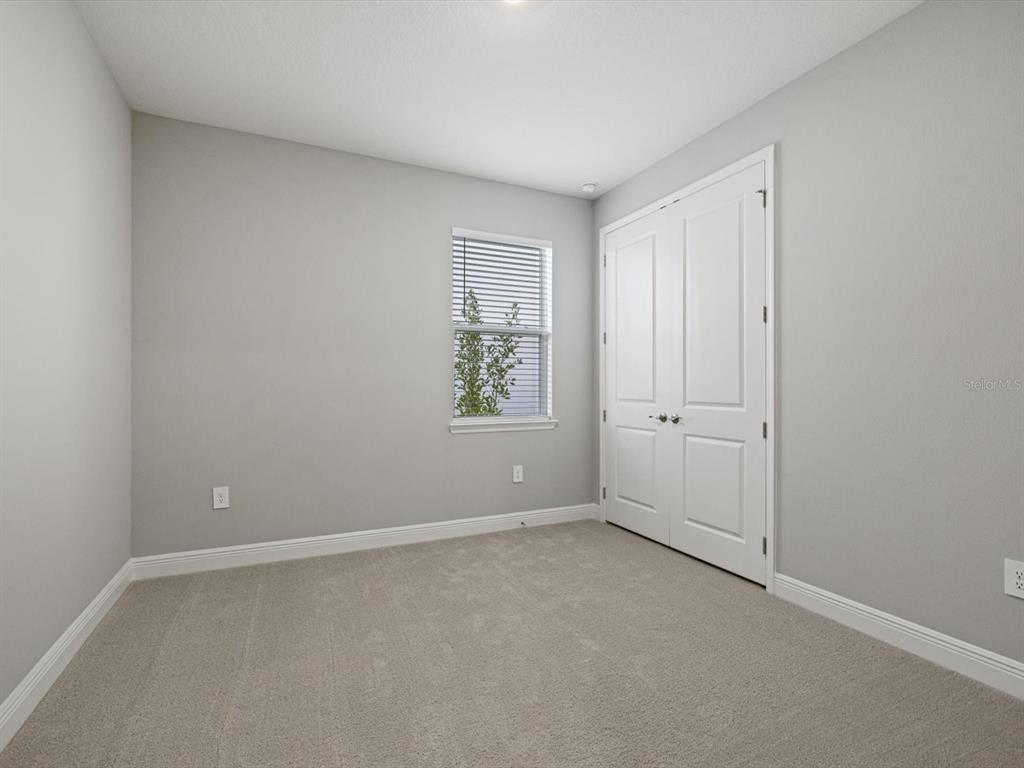 17707 Gulf Rnch Place Bradenton, FL 34211 - Photo 23 of 27 a view of an empty room with a window