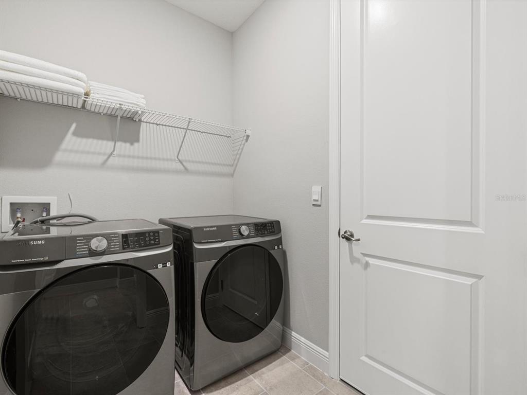 17707 Gulf Rnch Place Bradenton, FL 34211 - Photo 26 of 27 a utility room with dryer and washer
