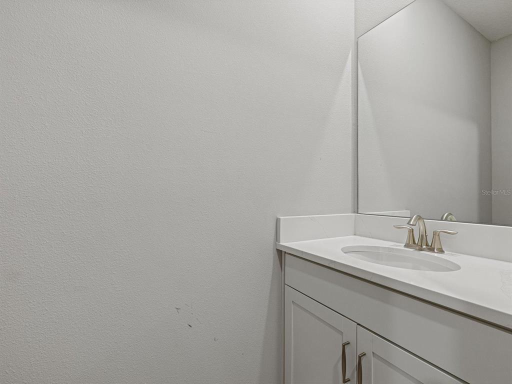 17707 Gulf Rnch Place Bradenton, FL 34211 - Photo 27 of 27 a bathroom with a sink and vanity