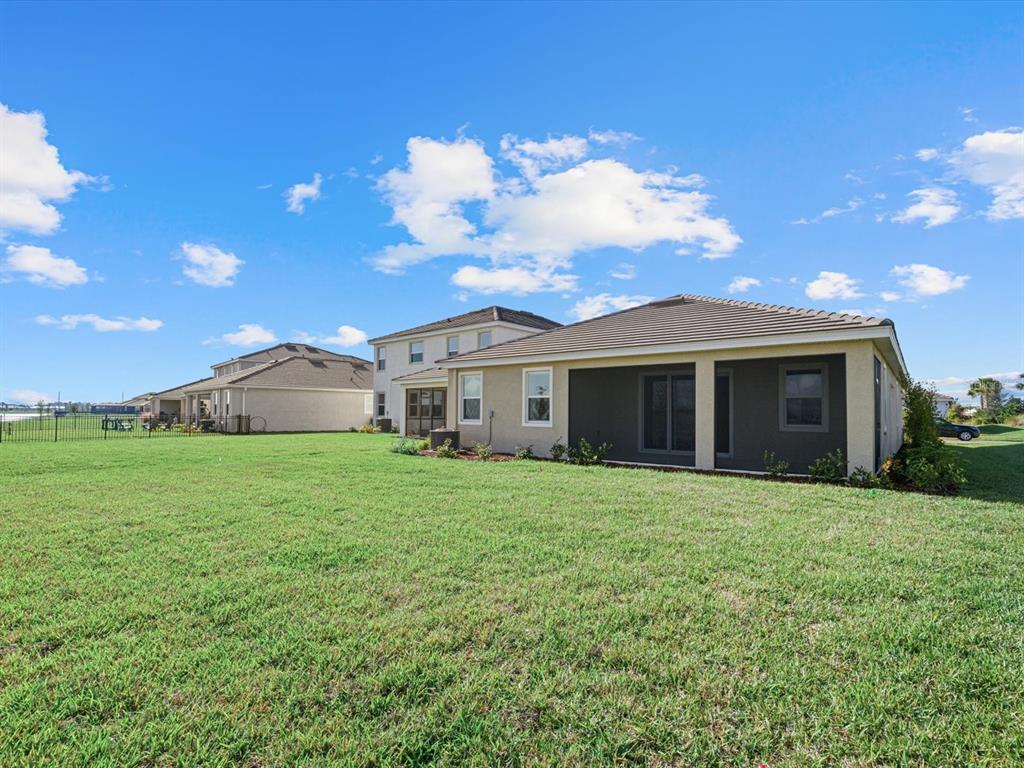 17707 Gulf Rnch Place Bradenton, FL 34211 - Photo 3 of 27 a view of a backyard of the house