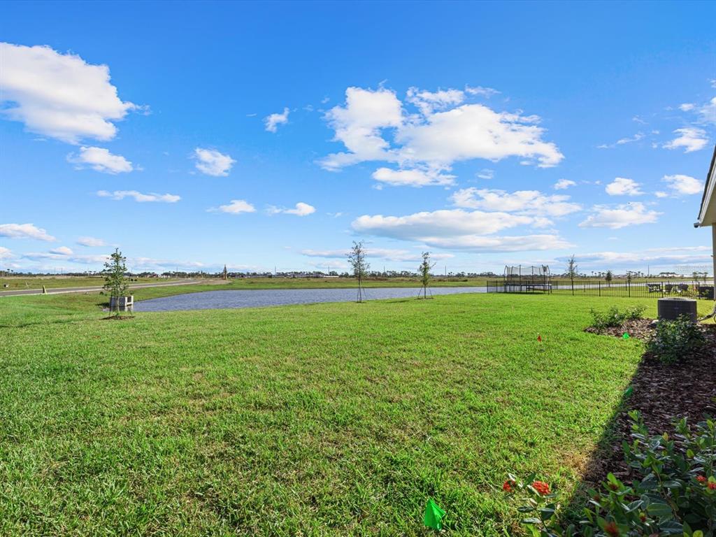 17707 Gulf Rnch Place Bradenton, FL 34211 - Photo 4 of 27 a view of a golf course with green space