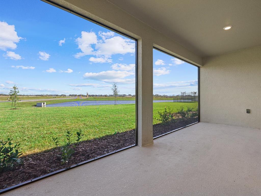 17707 Gulf Rnch Place Bradenton, FL 34211 - Photo 5 of 27 a view of a garden and an empty room