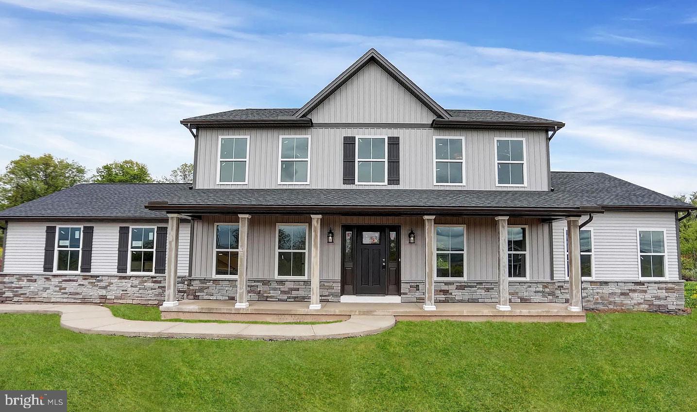 a front view of a house with having yard
