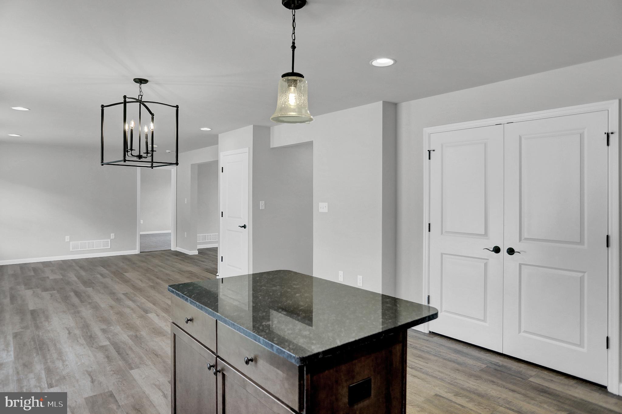 58 Pine Tree Drive Duncannon, PA 17020 - Photo 15 of 53 a kitchen with cabinets and wooden floor