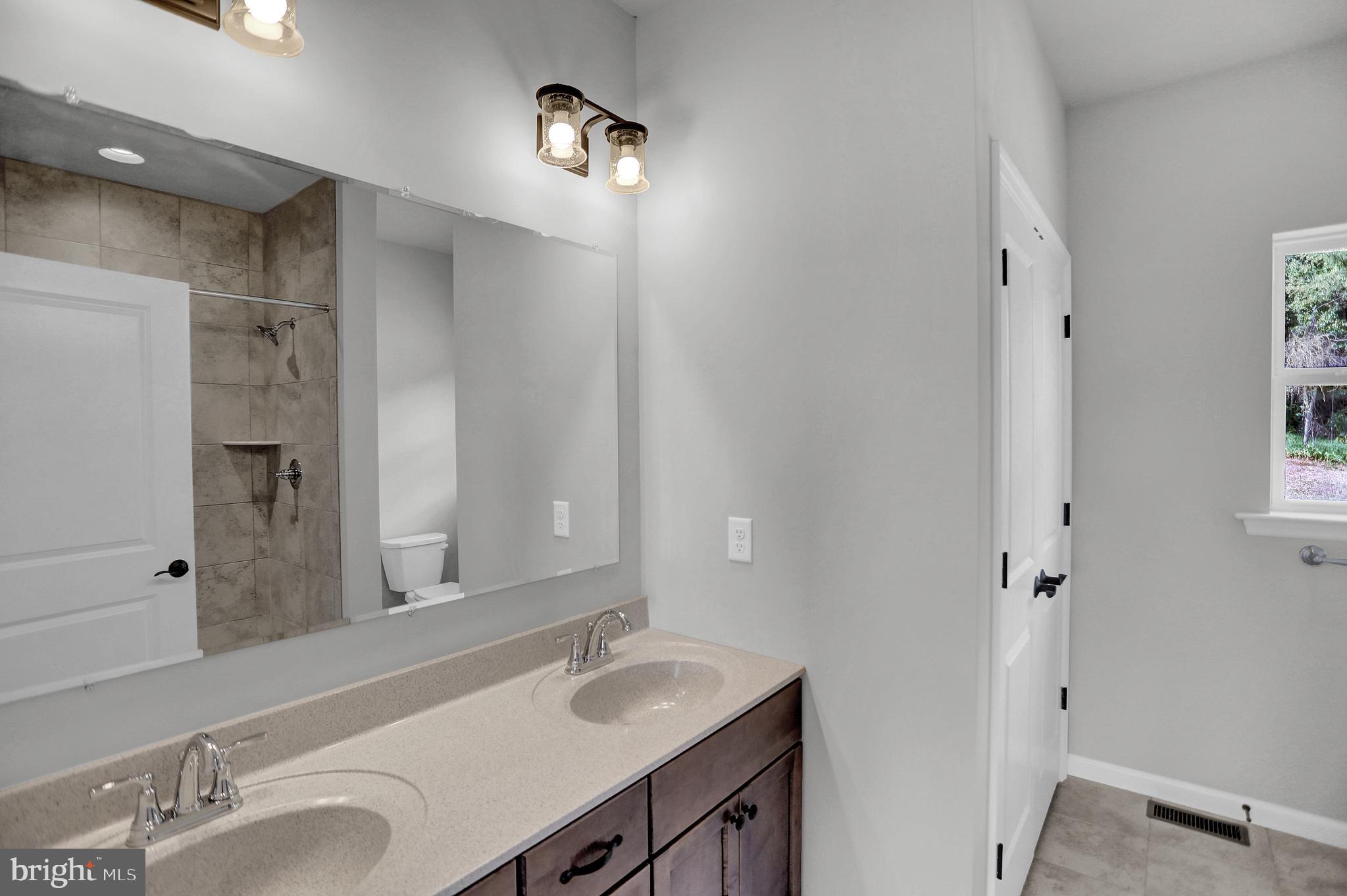 58 Pine Tree Drive Duncannon, PA 17020 - Photo 43 of 53 a bathroom with a sink and a mirror