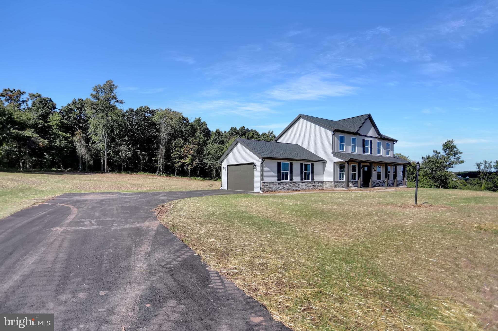 58 Pine Tree Drive Duncannon, PA 17020 - Photo 5 of 53 a front view of a house with a yard