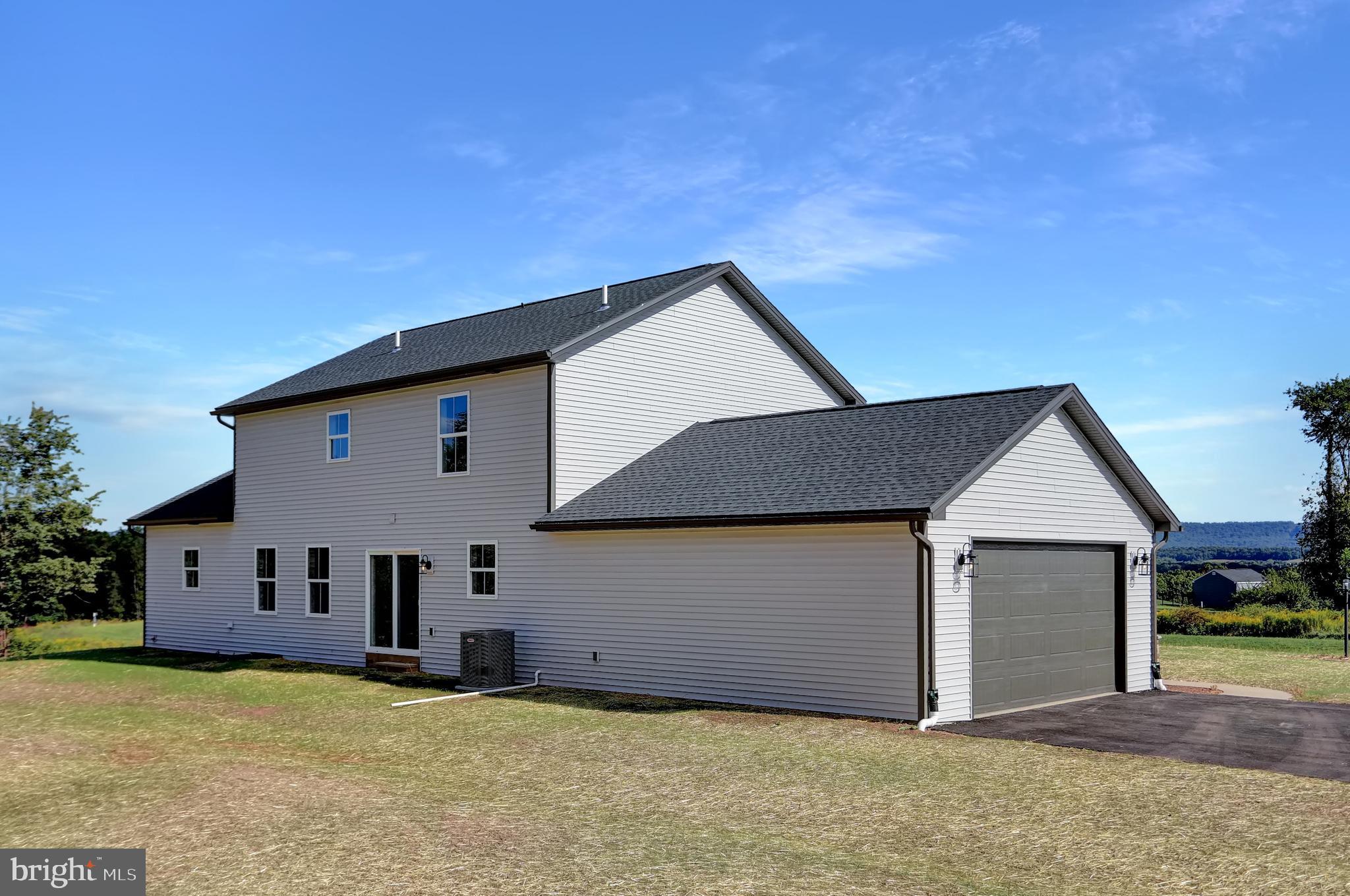 58 Pine Tree Drive Duncannon, PA 17020 - Photo 7 of 53 a front view of a house with a yard