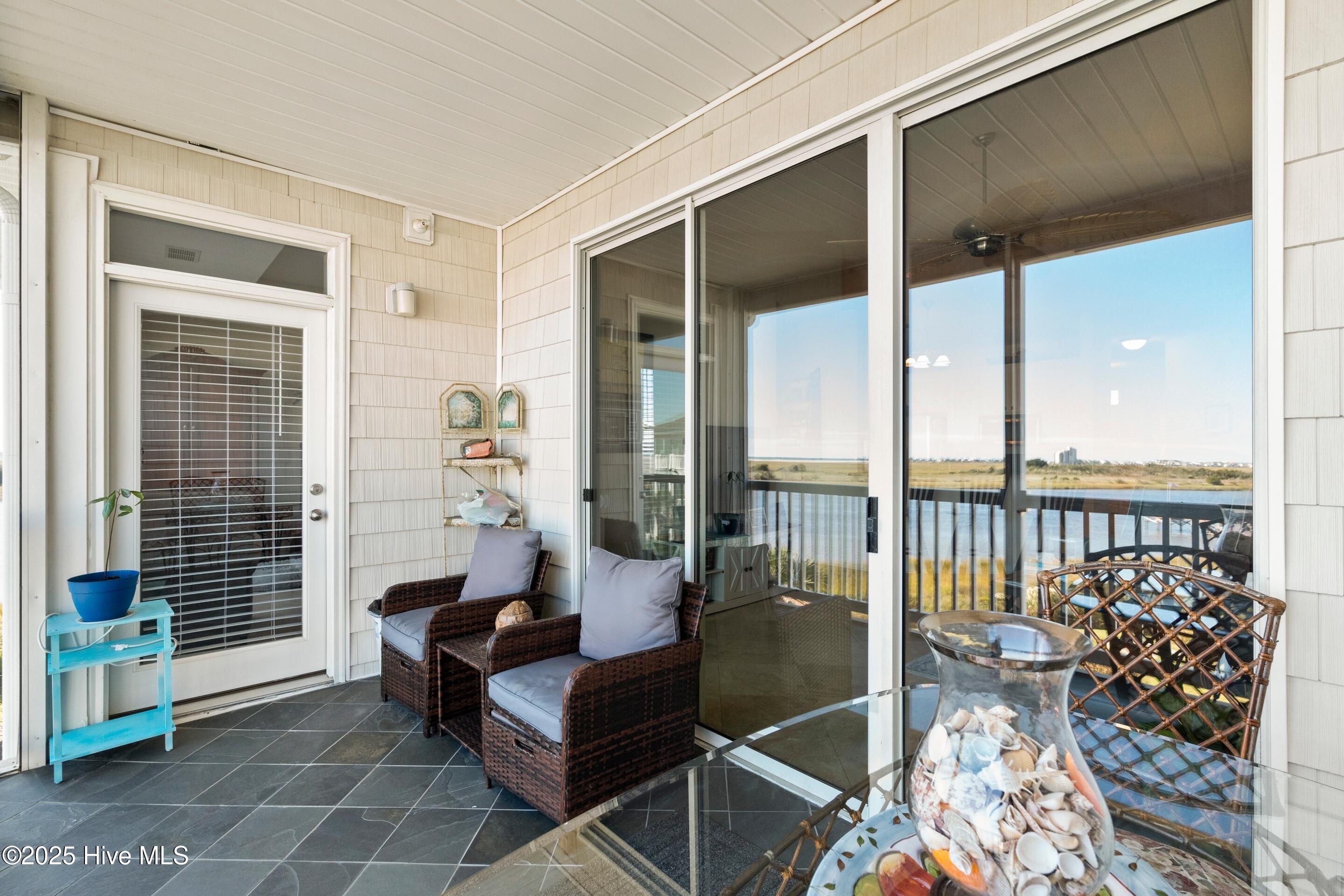 1135 Park Road Southwest, Unit 2304 Sunset Beach, NC 28468 - Photo 23 of 45 Access to living room OR owners' suite - watch the sunrise with your coffee in hand.