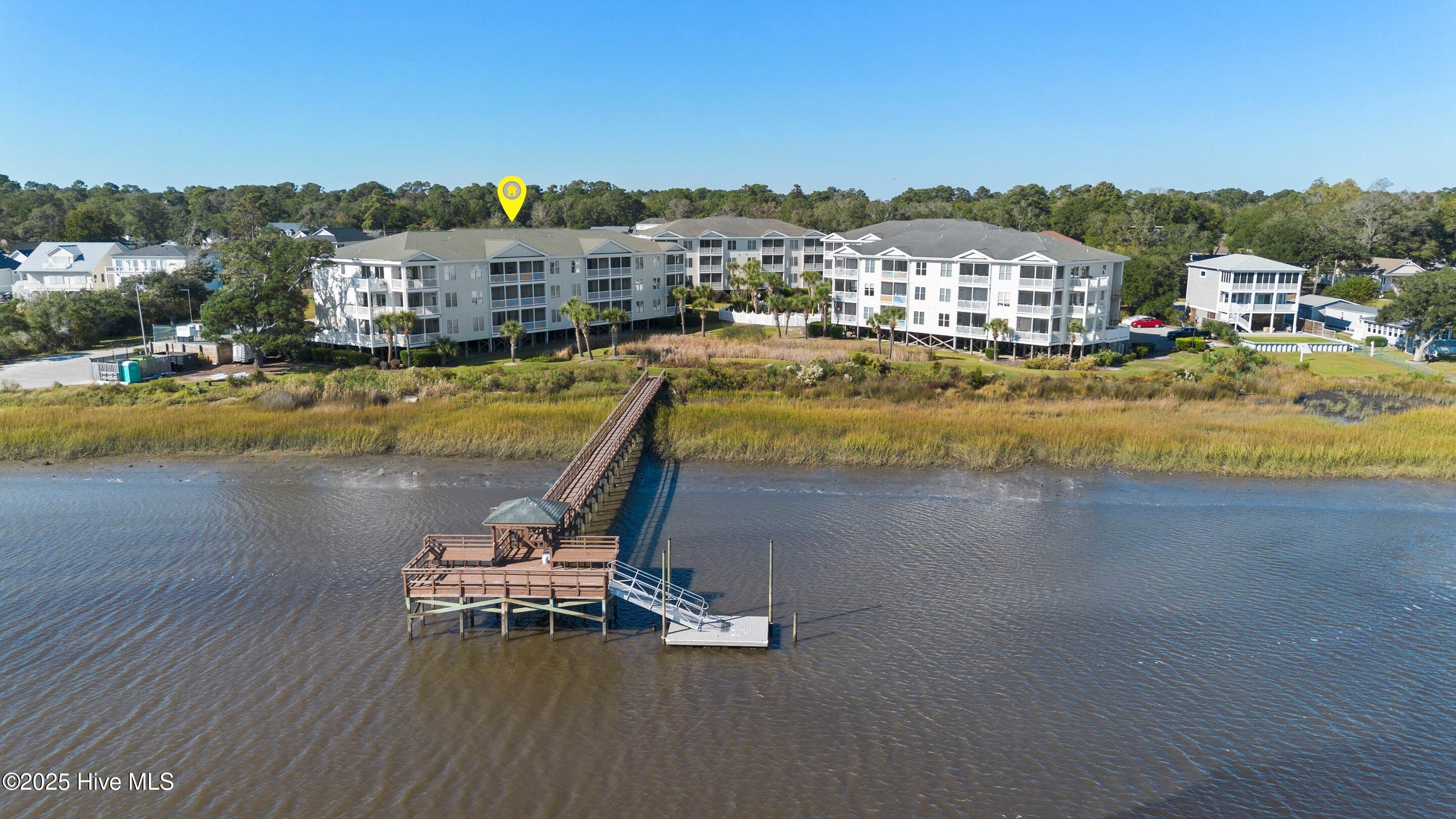 1135 Park Road Southwest, Unit 2304 Sunset Beach, NC 28468 - Photo 39 of 45 Walkway and pier