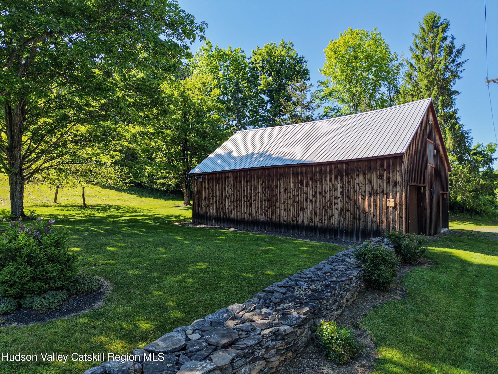 221 Camp Medusa Road Rensselaerville, NY 12120 - Photo 25 of 57 a view of a house with a yard