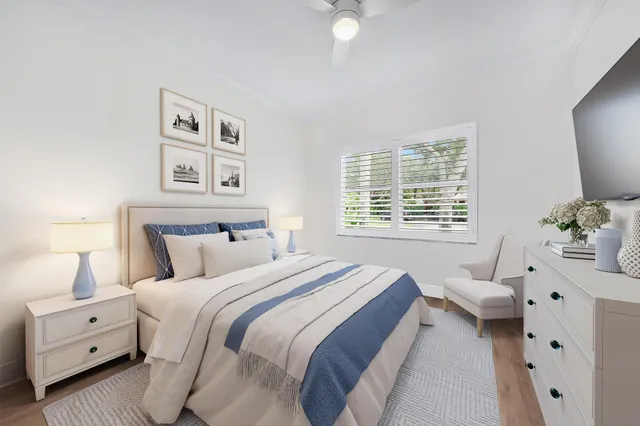 a bedroom with a bed and a couch