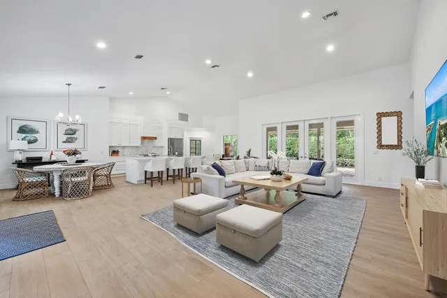 a living room with furniture and a table