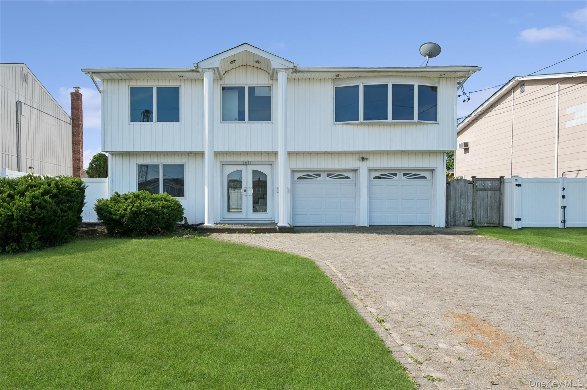2625 Riverside Drive Wantagh, NY 11793 - Photo 2 of 20 a house view with a backyard space