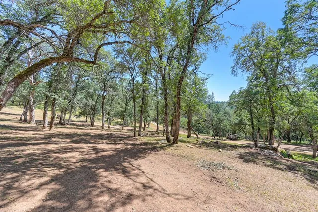 a view of a swimming pool with an outdoor space and seating area