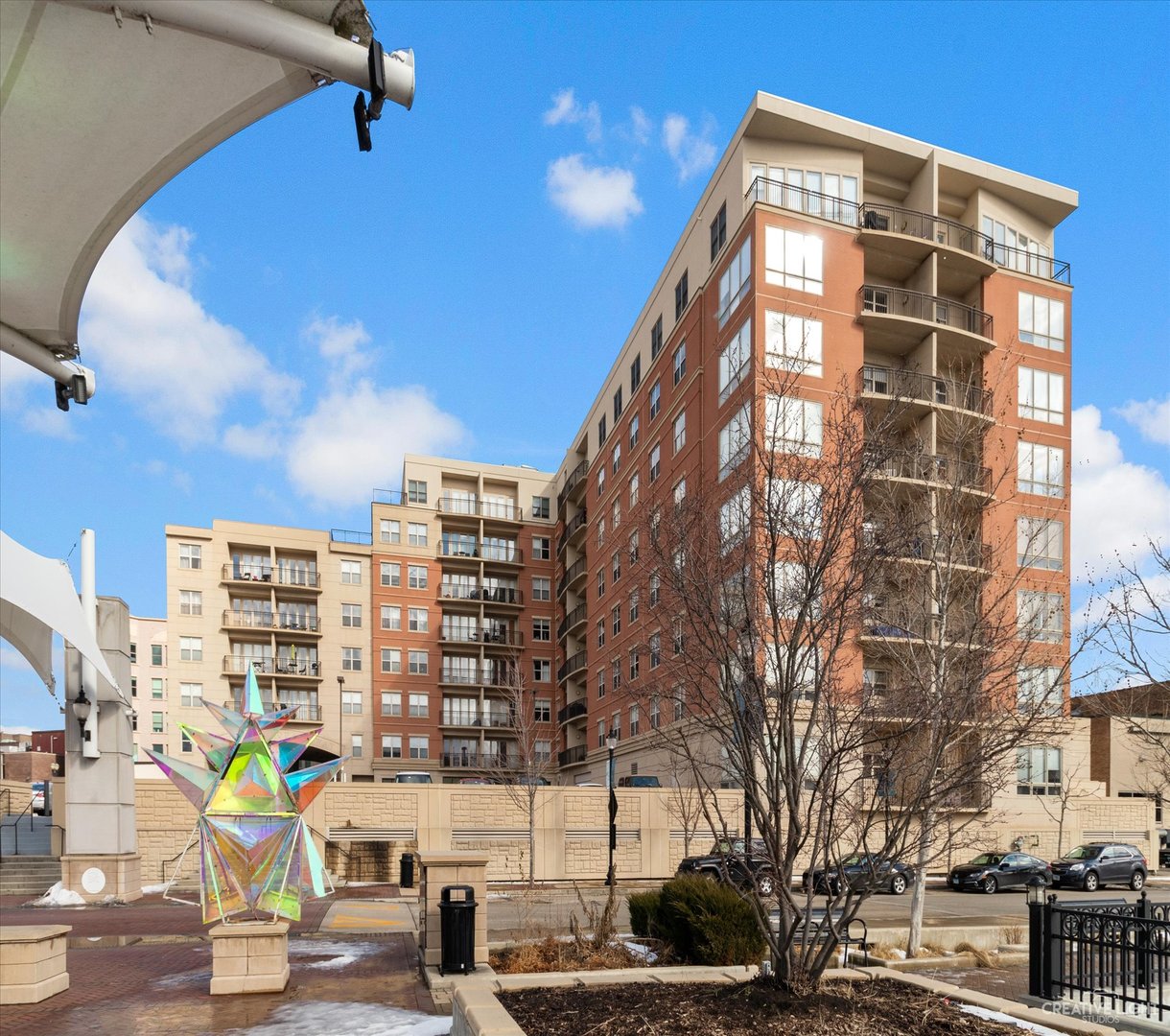 50 South Grove Avenue, Unit 410 Elgin, IL 60120 - Photo 2 of 12 a view of a building with a street