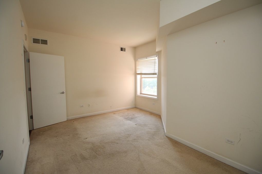 50 South Grove Avenue, Unit 410 Elgin, IL 60120 - Photo 7 of 12 a view of empty room