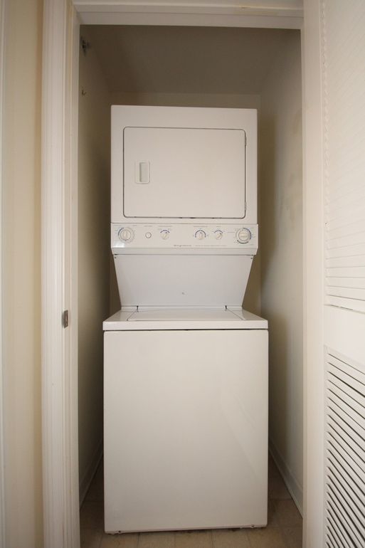 50 South Grove Avenue, Unit 410 Elgin, IL 60120 - Photo 10 of 12 a utility room with dryer and washer