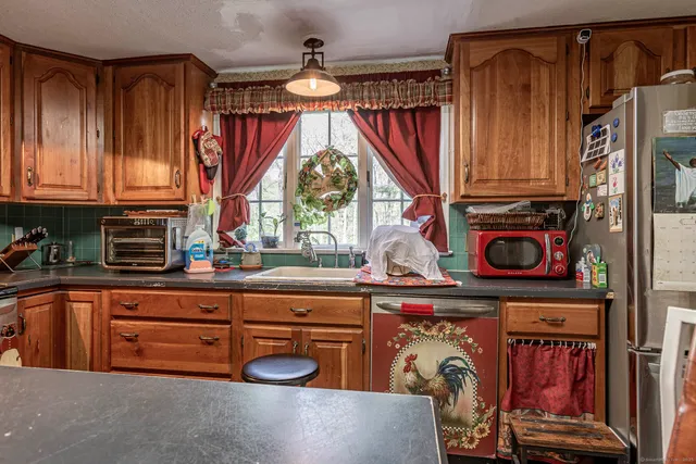 a view of a kitchen with electric equipment