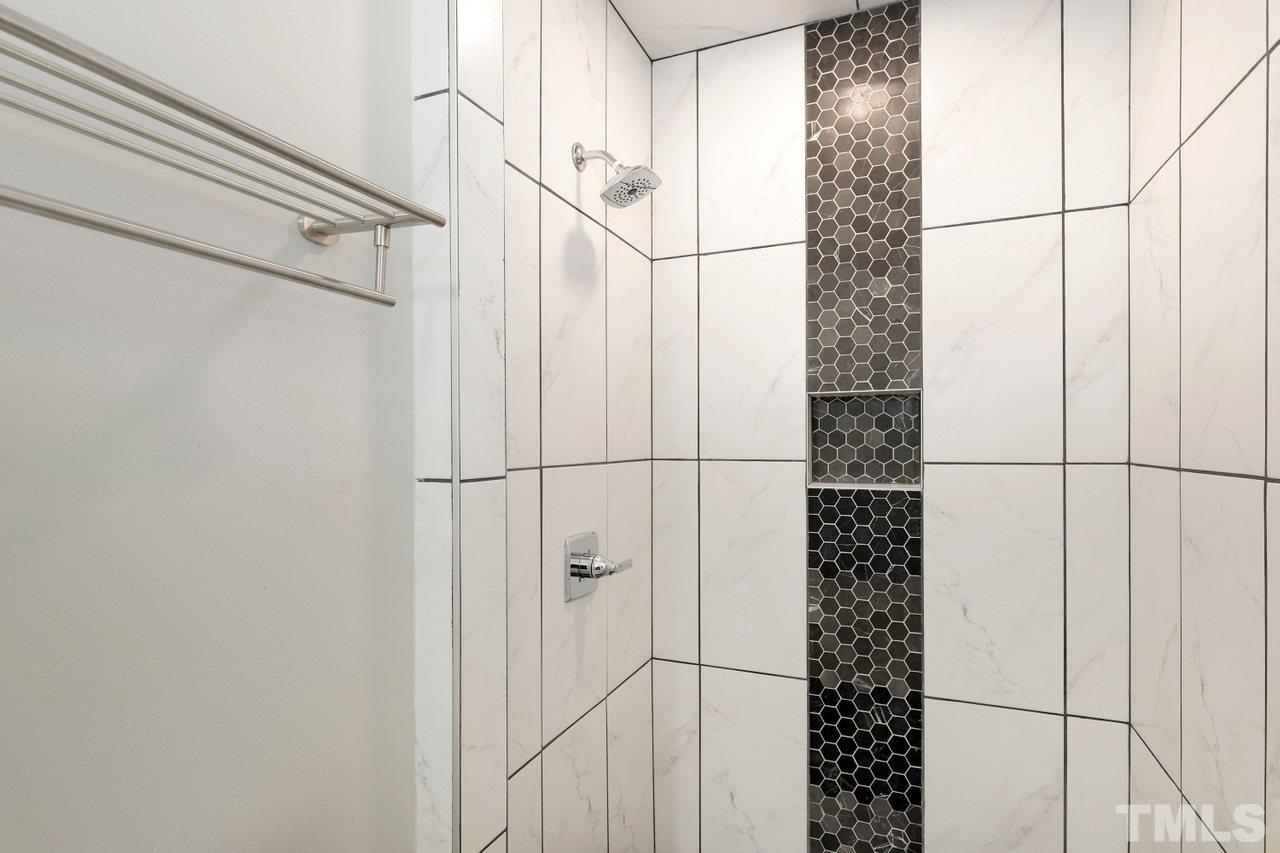 5309 Falls Of Neuse Road Raleigh, NC 27609 - Photo 16 of 38 a bathroom with a shower