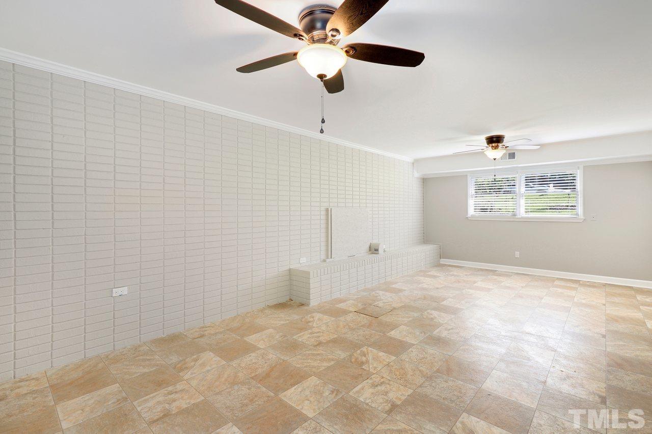 5309 Falls Of Neuse Road Raleigh, NC 27609 - Photo 25 of 38 a view of an empty room with a window