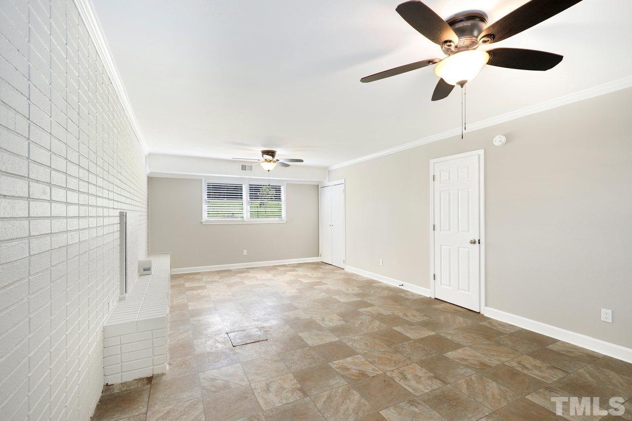 5309 Falls Of Neuse Road Raleigh, NC 27609 - Photo 26 of 38 a view of an empty room with a window