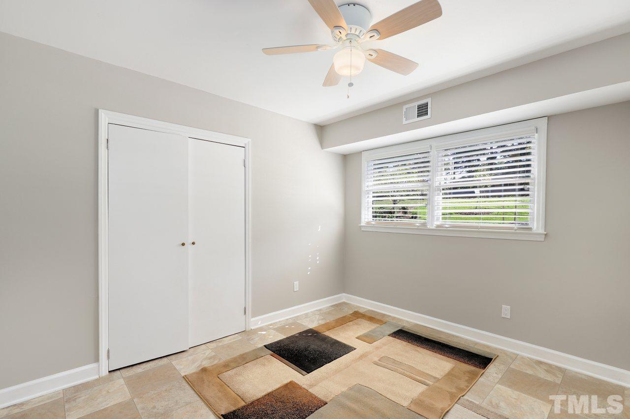 5309 Falls Of Neuse Road Raleigh, NC 27609 - Photo 27 of 38 a view of a room that has a window in it