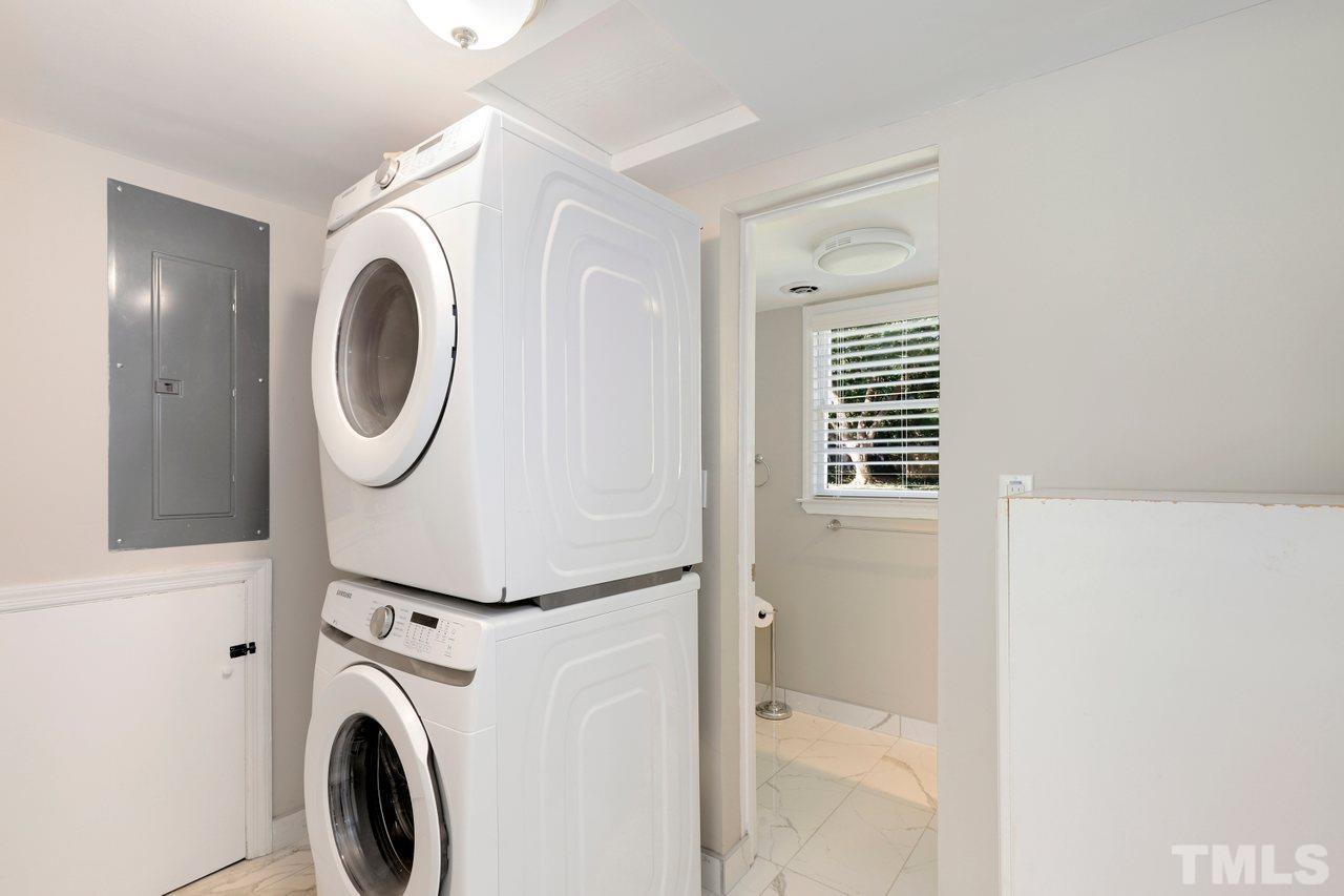 5309 Falls Of Neuse Road Raleigh, NC 27609 - Photo 29 of 38 a utility room with dryer and washer