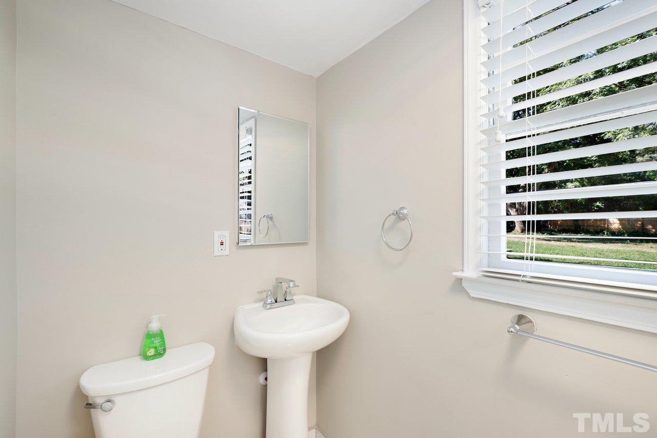 5309 Falls Of Neuse Road Raleigh, NC 27609 - Photo 30 of 38 a bathroom with a sink and a toilet