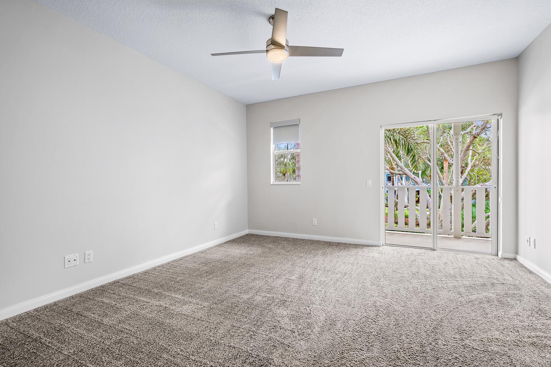 3184 West Community Drive Jupiter, FL 33458 - Photo 19 of 25 a view of an empty room with a window