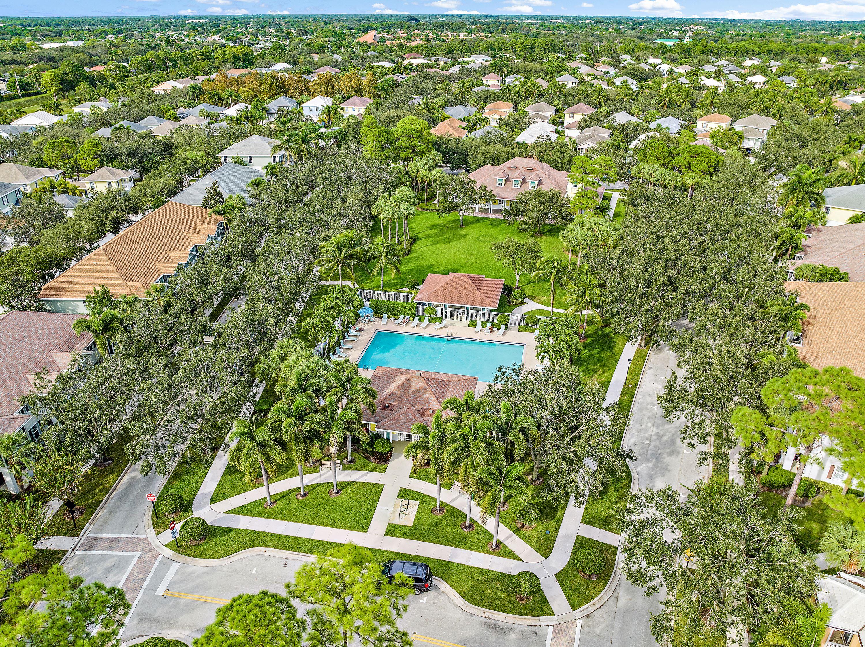 3184 West Community Drive Jupiter, FL 33458 - Photo 2 of 25 a view of a yard with chairs