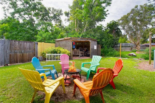 a view of an outdoor sitting area with furniture