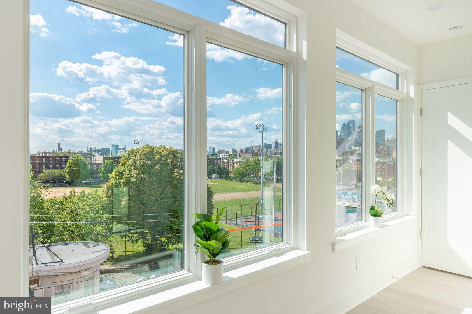 833 Wharton Street, Unit 2B405 Philadelphia, PA 19147 - Photo 2 of 15 a view of a glass door and porch