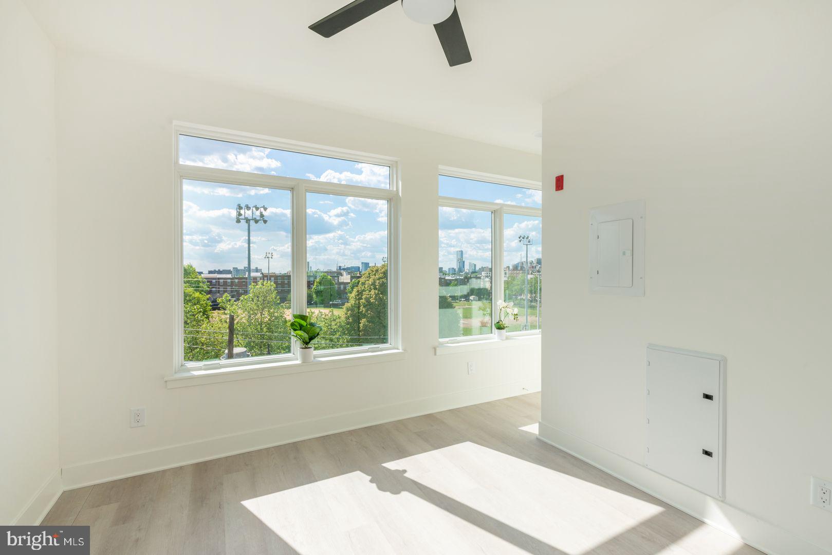 833 Wharton Street, Unit 2B405 Philadelphia, PA 19147 - Photo 10 of 15 a view of an empty room with a window