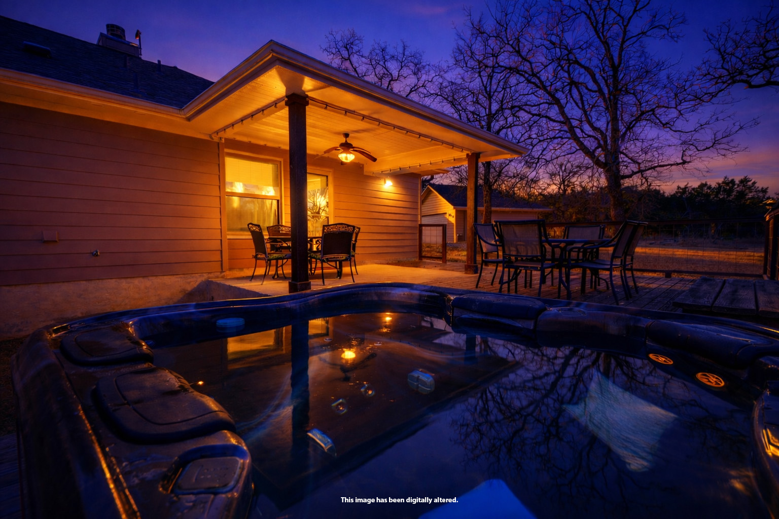 489 Nordic Ridge Road Bertram, TX 78605 - Photo 12 of 19 Pool at dusk with outdoor dining area and a patio area