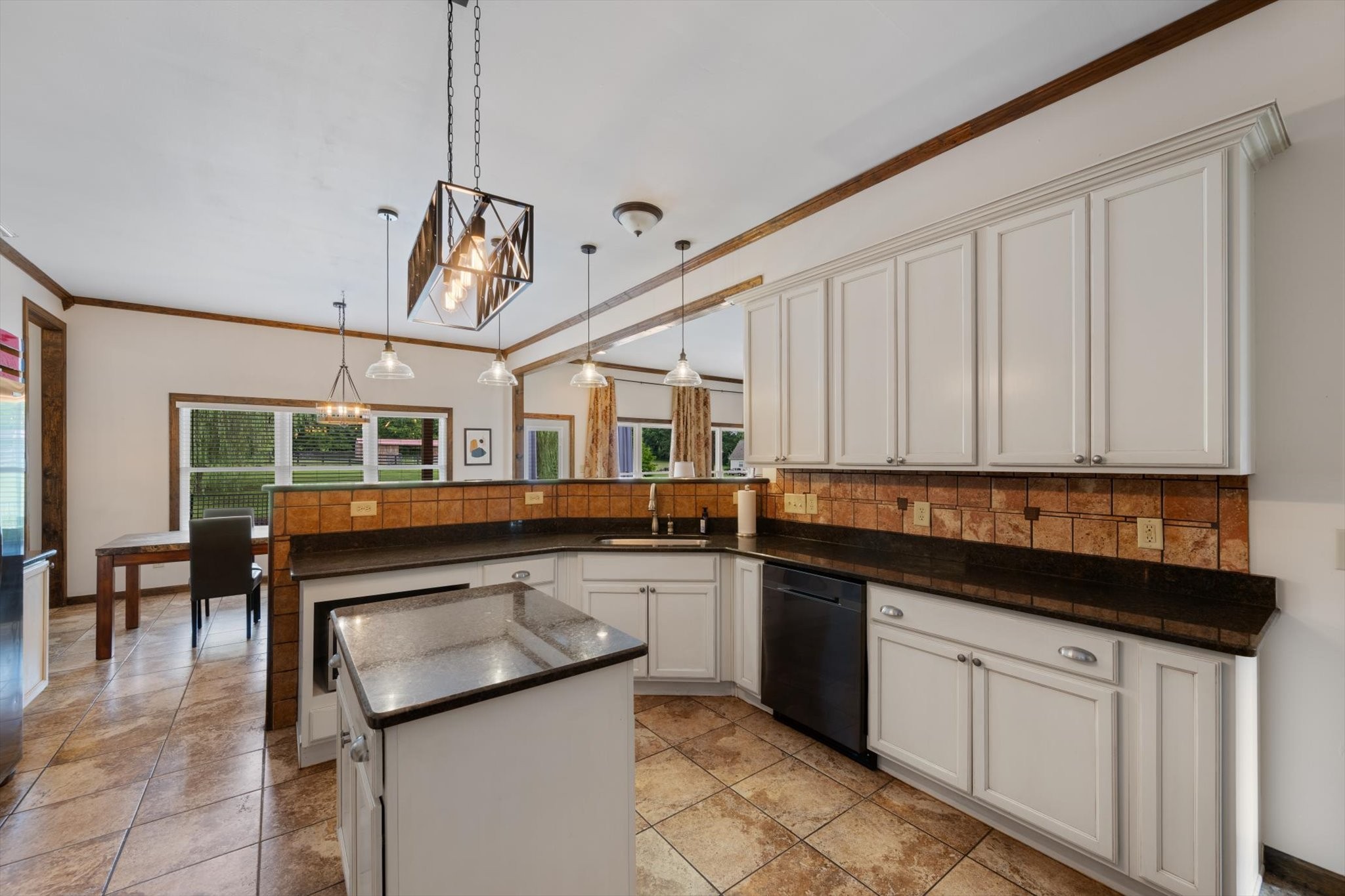1779 Sedberry Road Franklin, TN 37064 - Photo 41 of 71 a kitchen with stainless steel appliances granite countertop a sink and cabinets