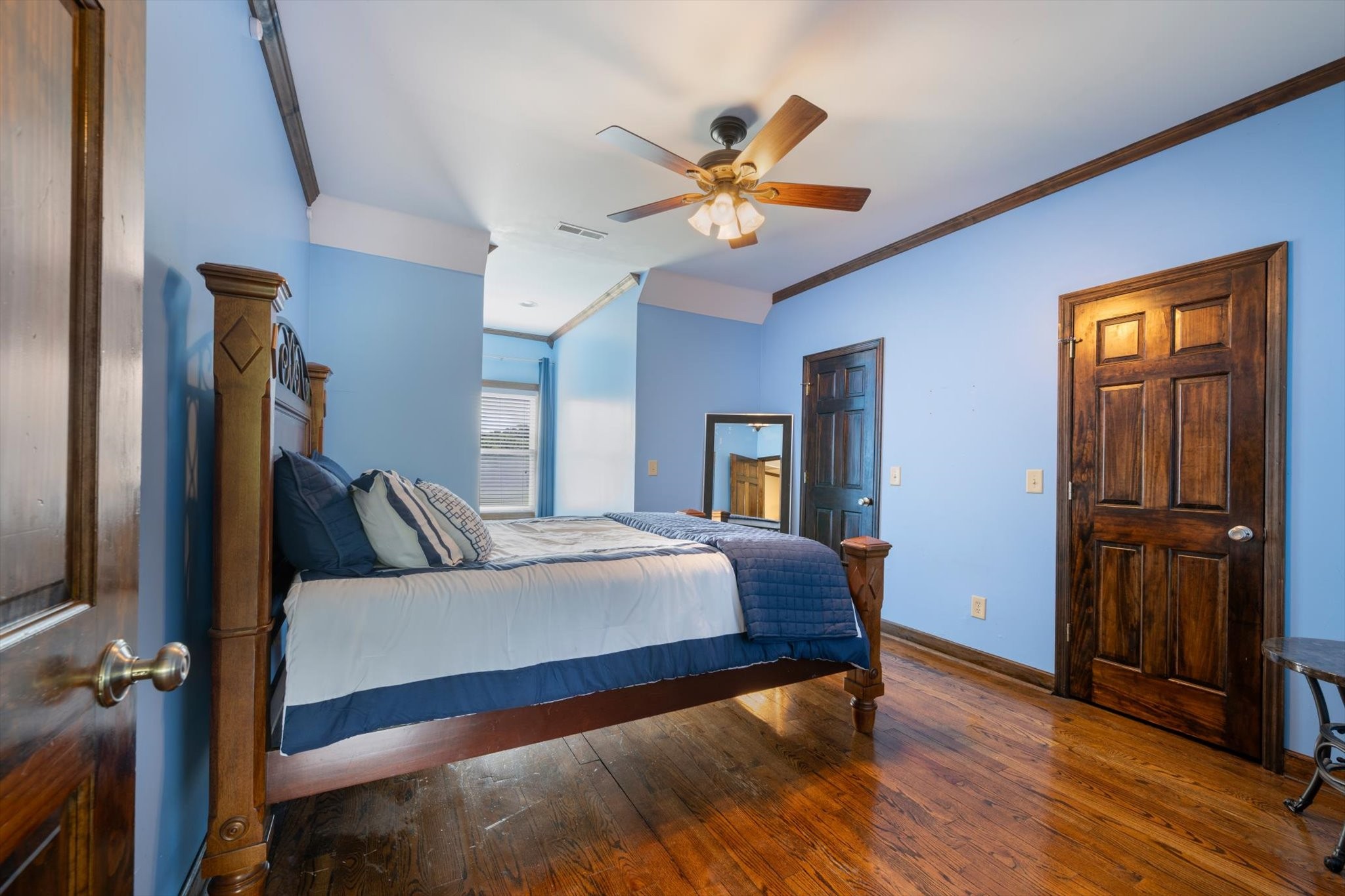 1779 Sedberry Road Franklin, TN 37064 - Photo 63 of 71 a bedroom with a bed and a chandelier