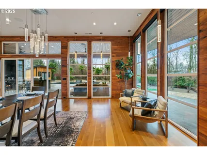 a open kitchen with stainless steel appliances kitchen island granite countertop a large kitchen island a stove and a sink