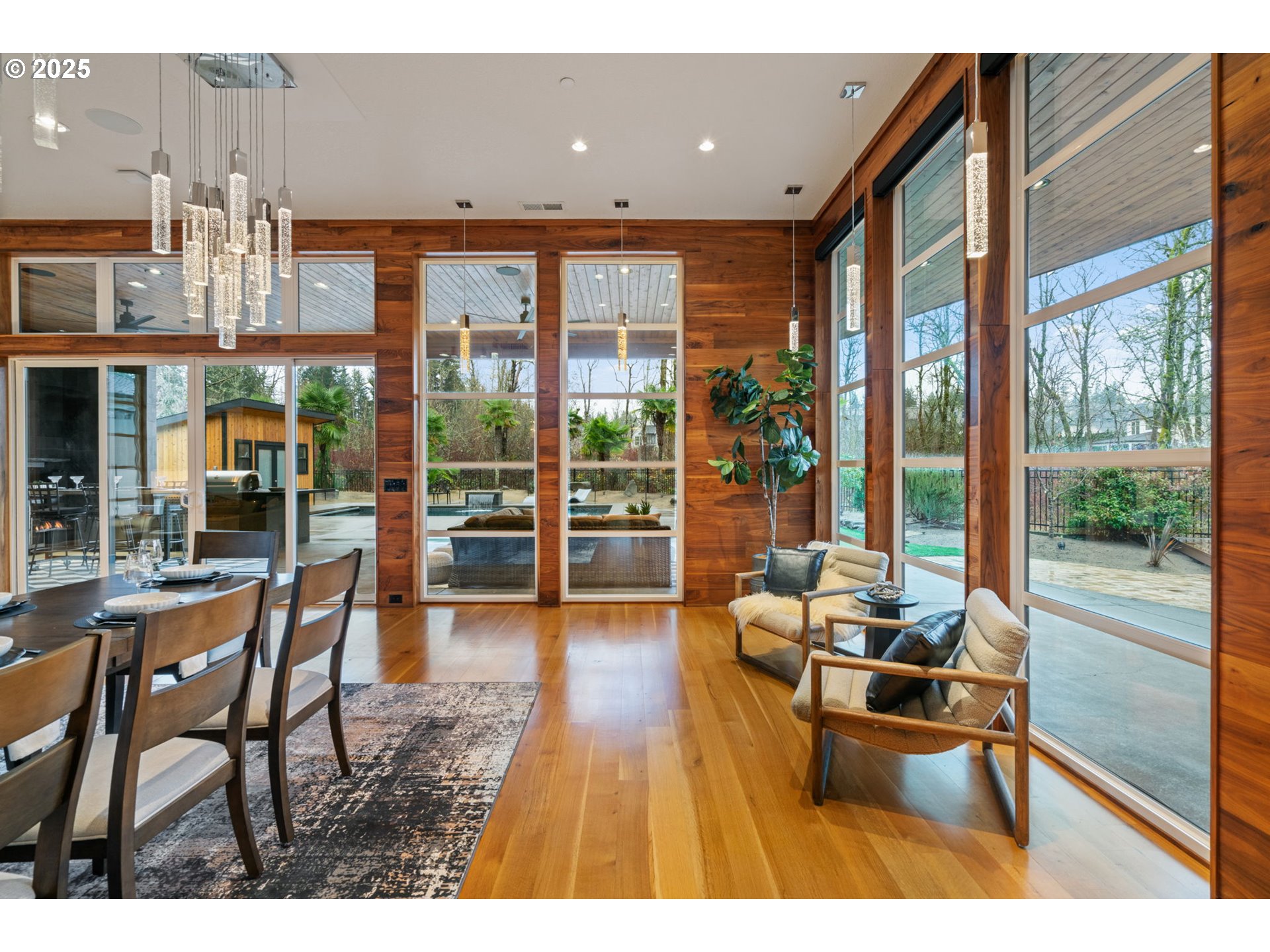 6730 Northwest Longbow Lane Camas, WA 98607 - Photo 19 of 45 a living room with furniture and large windows