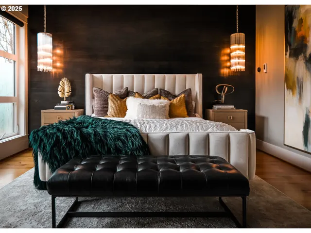 a large bathroom with a sink mirror and a shower