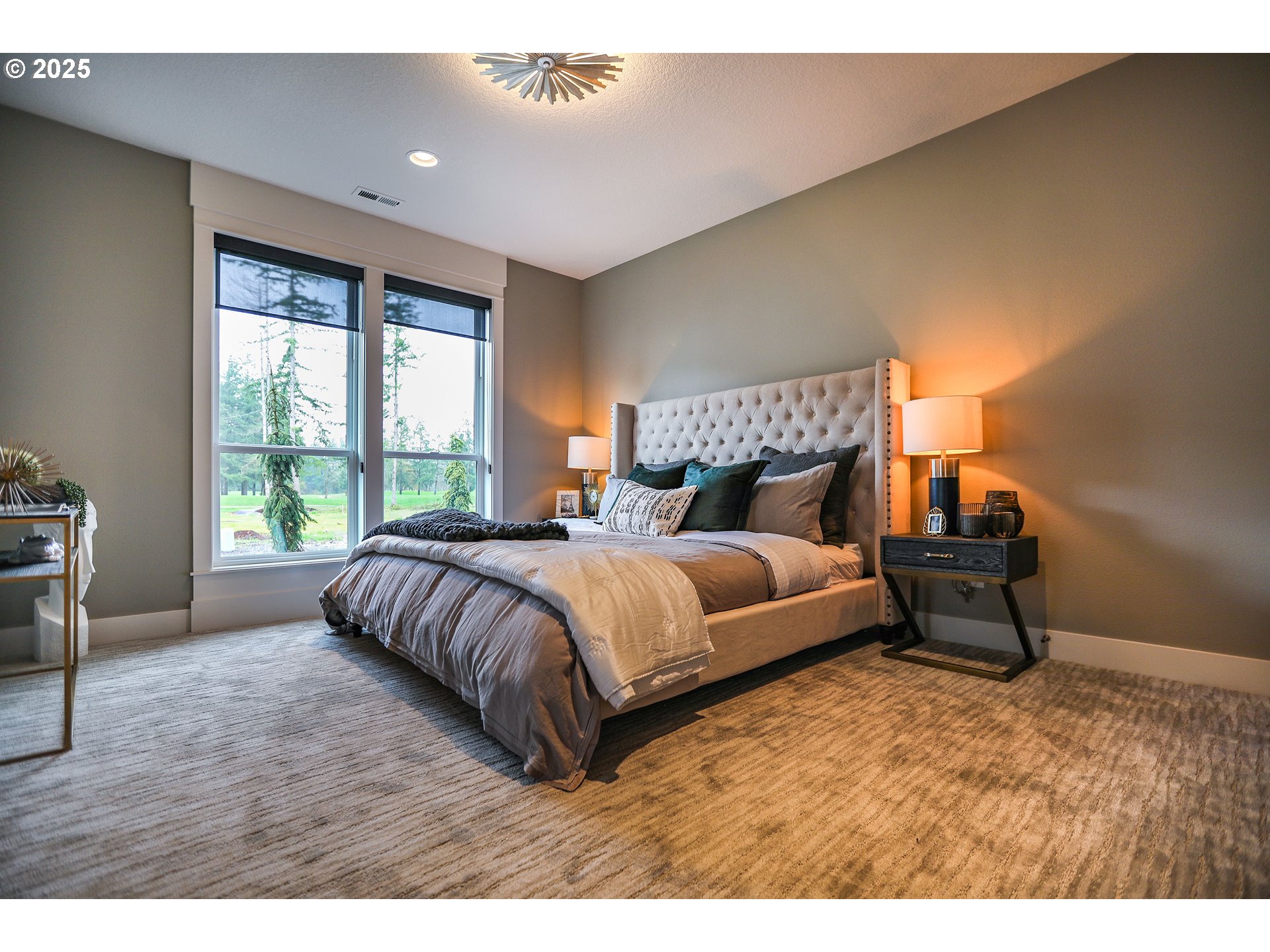 6730 Northwest Longbow Lane Camas, WA 98607 - Photo 29 of 45 a bedroom with a bed and wooden floor